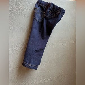 New without tags never worn dark rinse jeans with a stretch waistband.